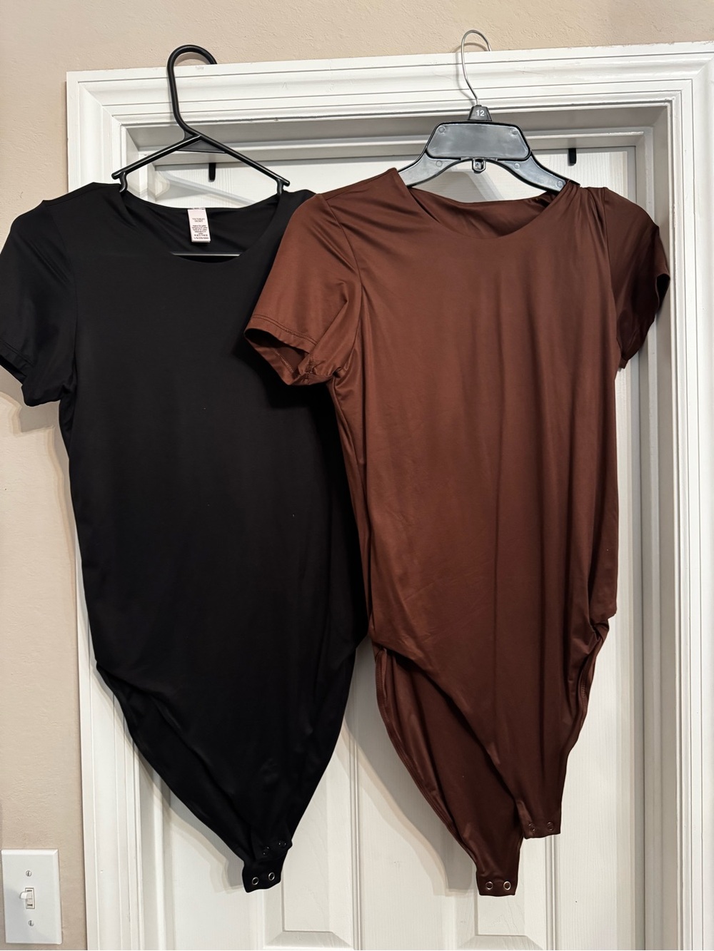 Victoria's Secret black and brown bodysuits Size L Set of 2